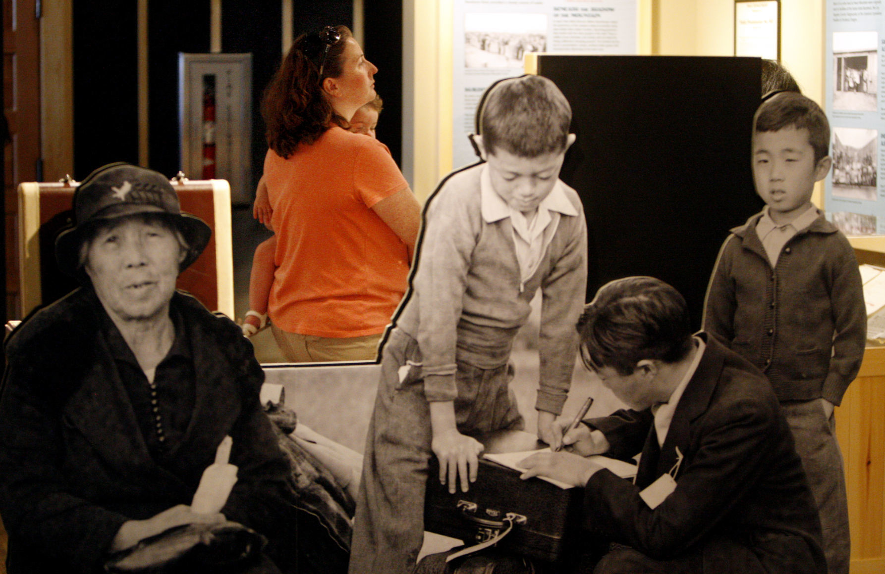 Life-sized photos at Heart Mountain Interpretive Learning Center